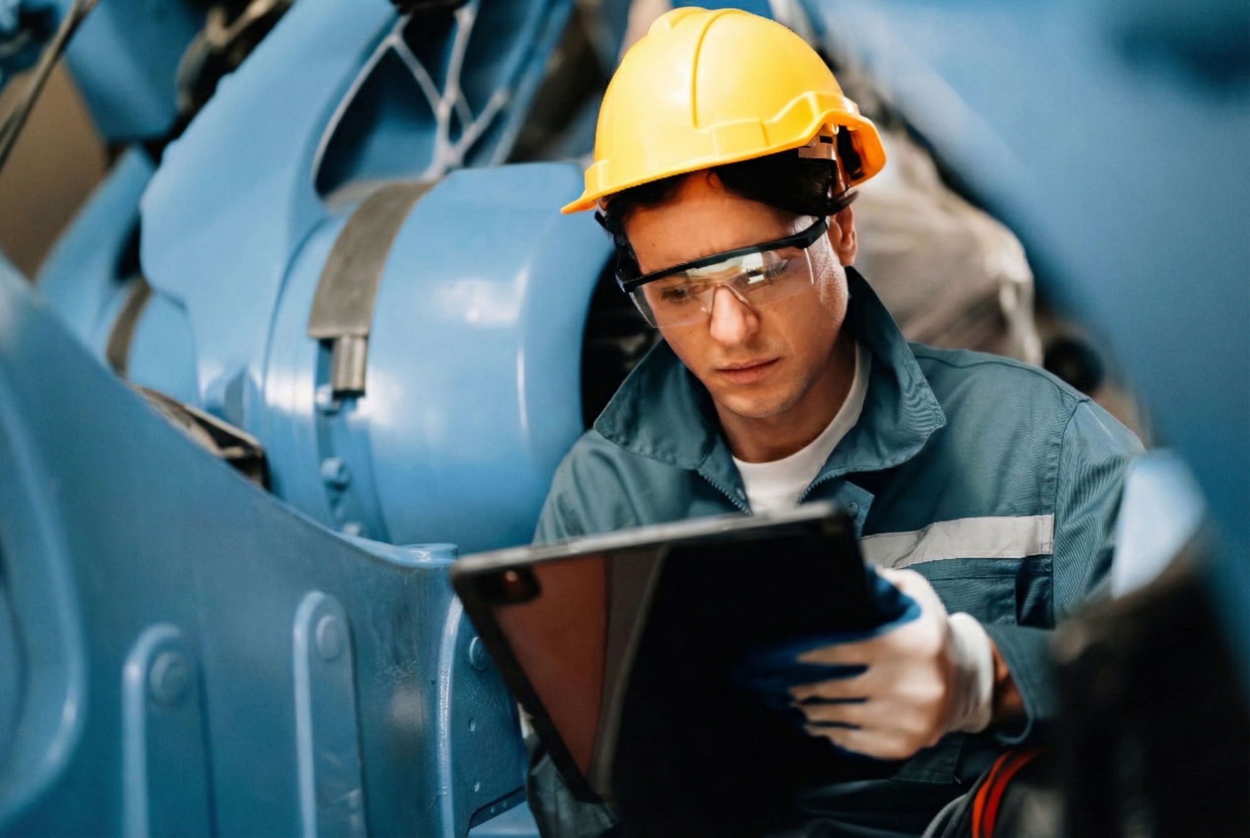 Technical review of industrial equipment during an operational assessment.